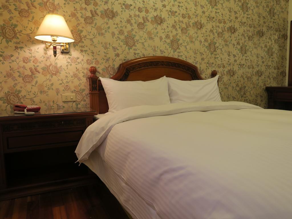 Champagne Hotel Jiaoxi Habitación foto